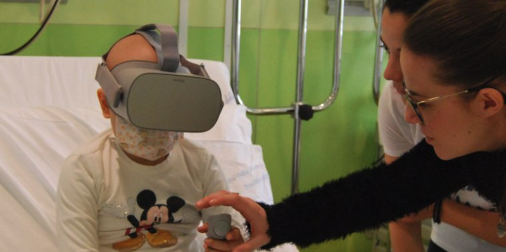 Young child using a RT3D experience to calm anxiety in the hospital. Game created using Unity software.